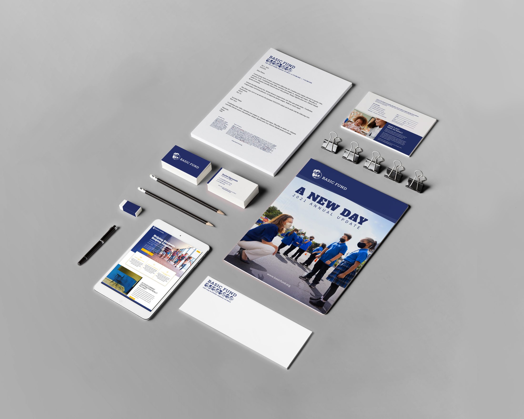 Basic Fund letterhead, envelopes, business cards and a notecard, each with a different logo