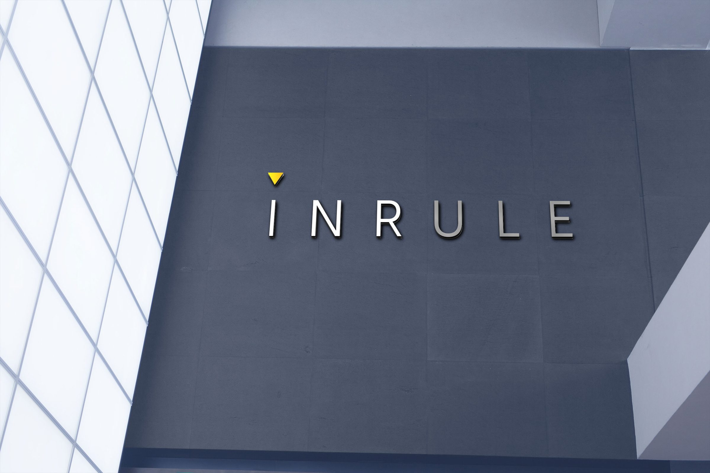 The InRule wordmark in dimensional letters on the office wall