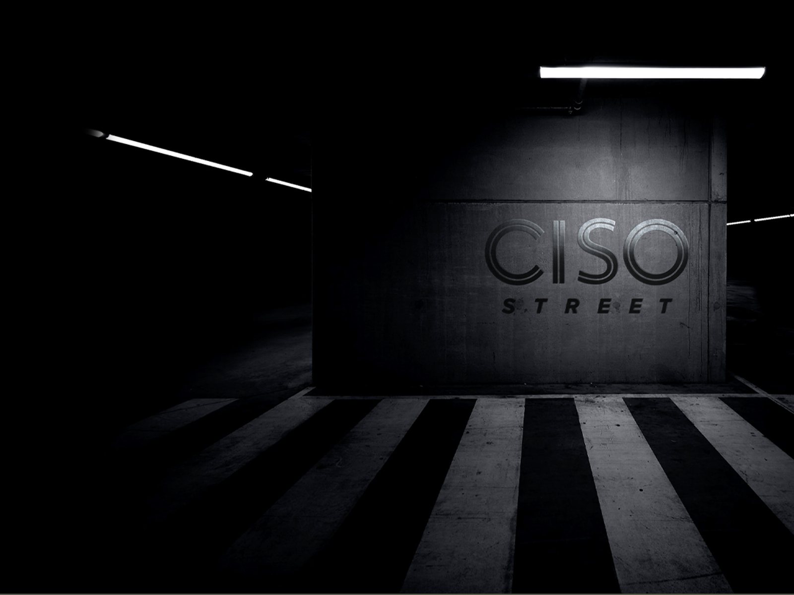 CISO Street channel art: the mark on a wall lit from above