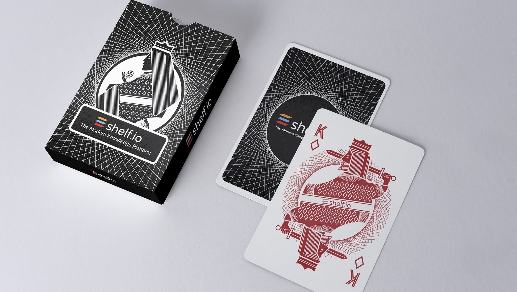 The tuck box and cards on a table